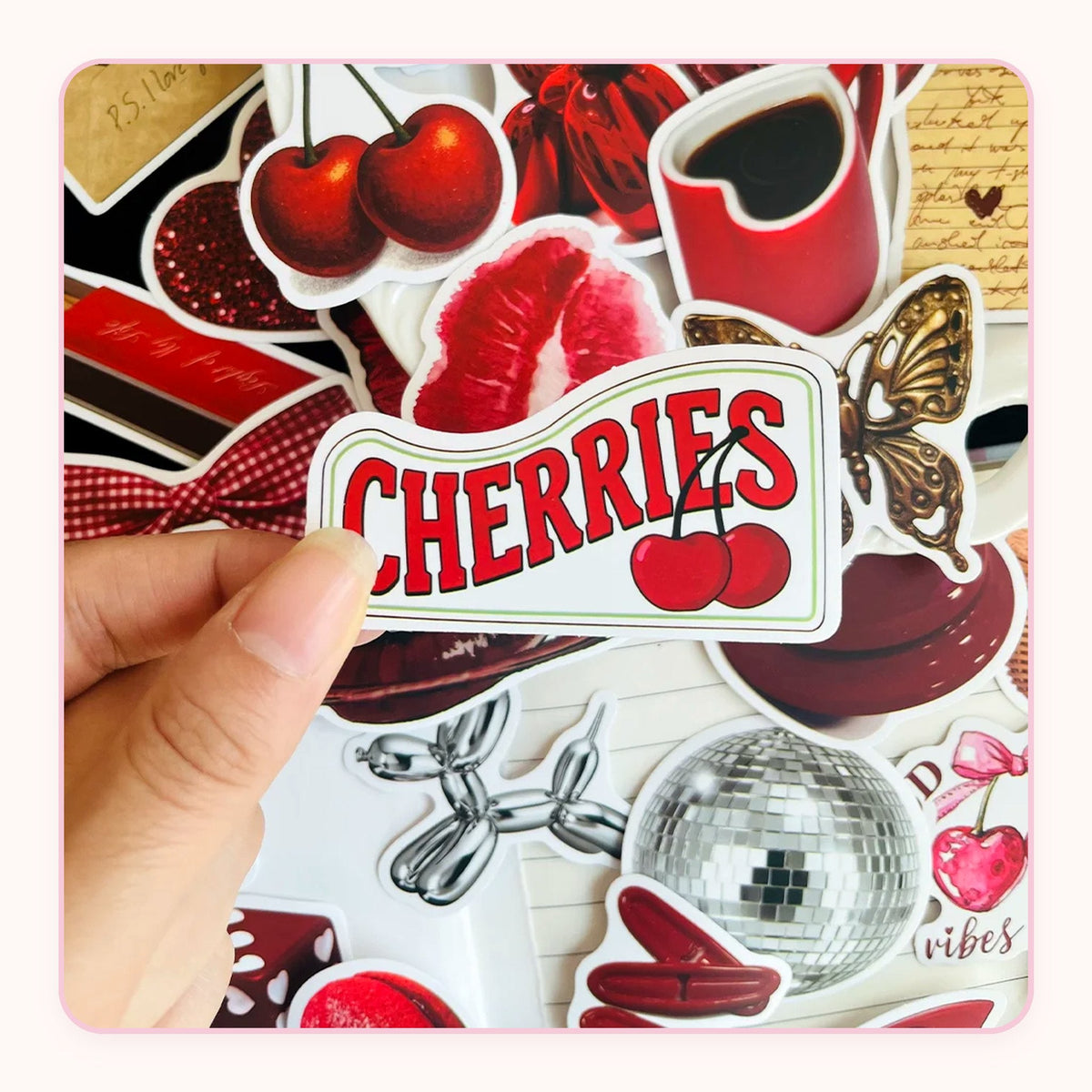 Red cherry-themed sticker pack with bows, lips and disco balls