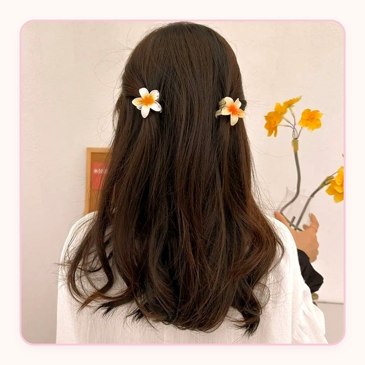 Six translucent plumeria flower claw clips in pastel colors