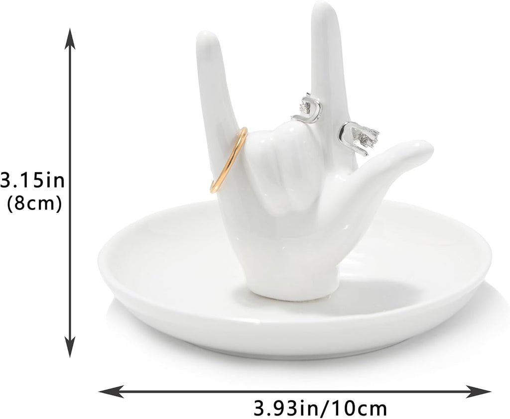 Close-up of white ceramic I Love You hand ring dish